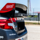 Illustration for article titled I Knew Austin's Rallycross Course Would Be Pure Mayhem After Riding In A 600 HP Subaru
